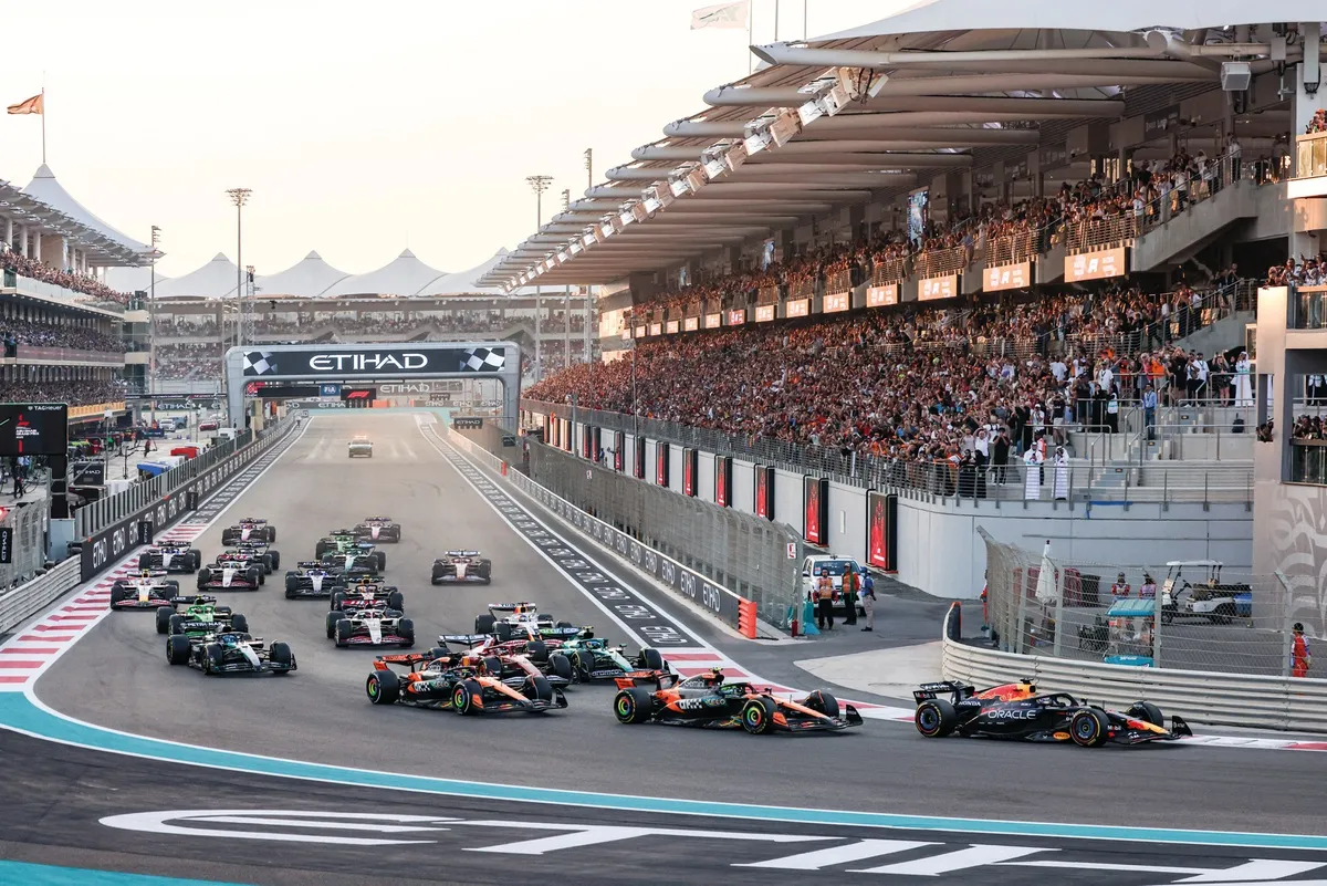 F1 cars lined up at the start of the race F1 cars lined up at the start of the race