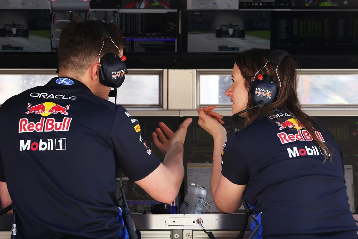 Red Bull Racing team members on the pit wall